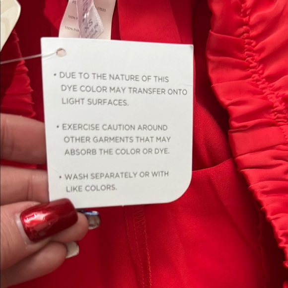 Fabletics Vibrant Red Eco Satin Cropped Pants with Black Accents - Picture 7 of 12